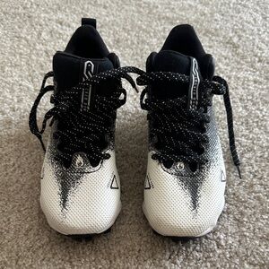 Under Armour Kids Black and White Football Cleats